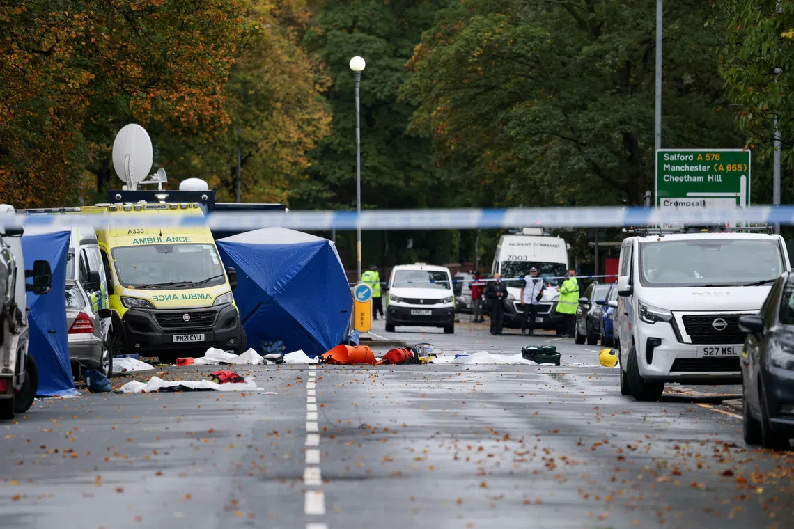 The area outside the Manchester synagogue, where multiple people were killed on Yom Kippur in what police have declared a terrorist incident, is cordoned off, in north Manchester, Britain, October 3, 2025. REUTERS/Hannah McKay