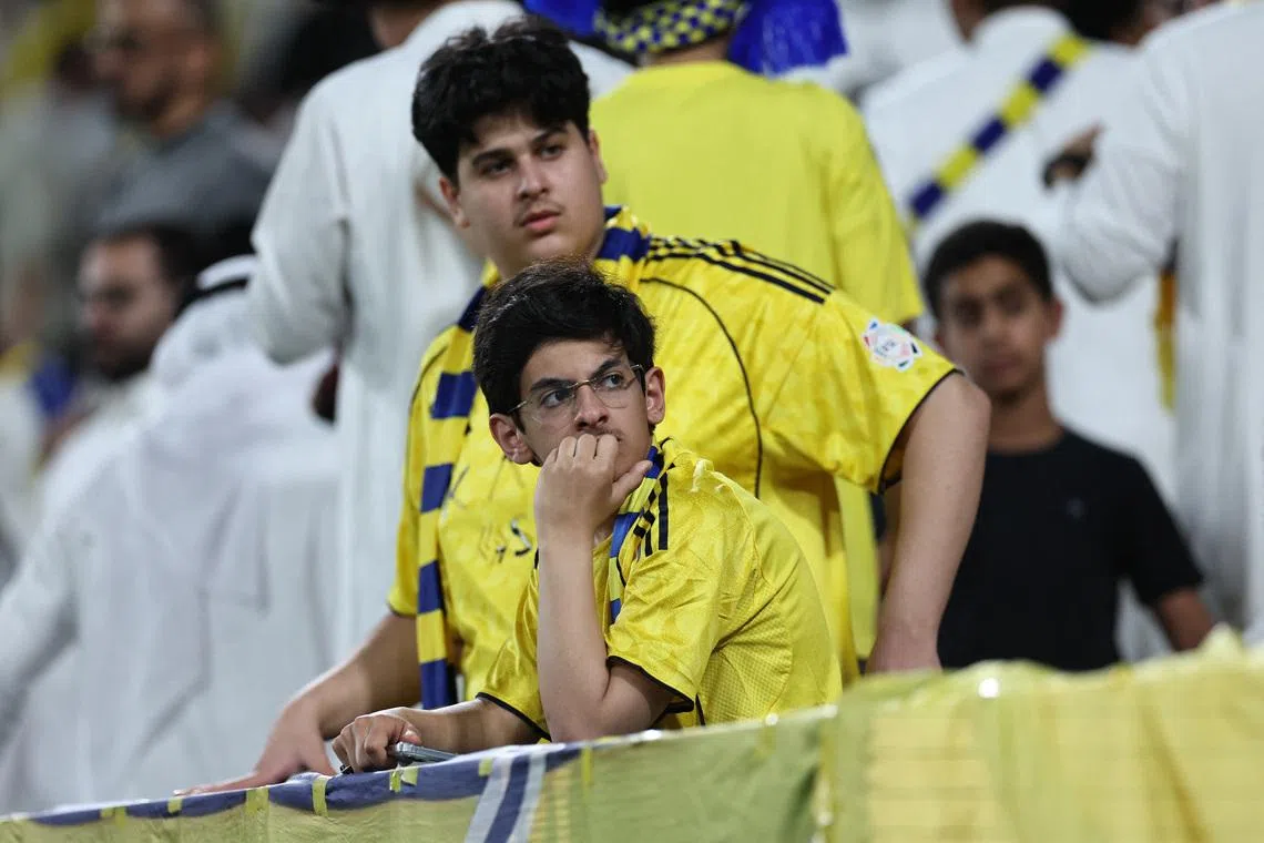 Soccer Football - Saudi Pro League - Al Nassr v Al Hilal - Al Awwal Park, Riyadh, Saudi Arabia - May 12, 2026 Al Nassr's fans react after Al Nassr's Bento scored an own goal and the first for Al Hilal REUTERS/Hamad I Mohammed