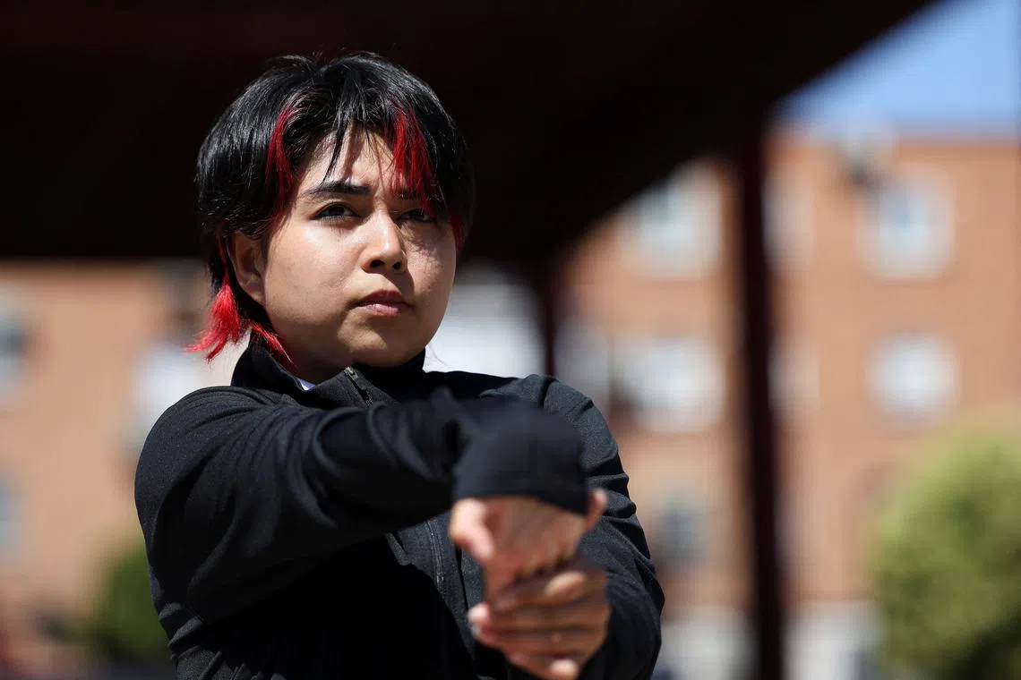 Afghan refugee and Breaking athlete Manizha Talash stretches her hand during a warm up prior to practice for the Paris 2024 Olympic Games, where the sport will make its Olympic debut, in Madrid, Spain, on June 11, 2024. REUTERS/Violeta Santos Moura/File Photo