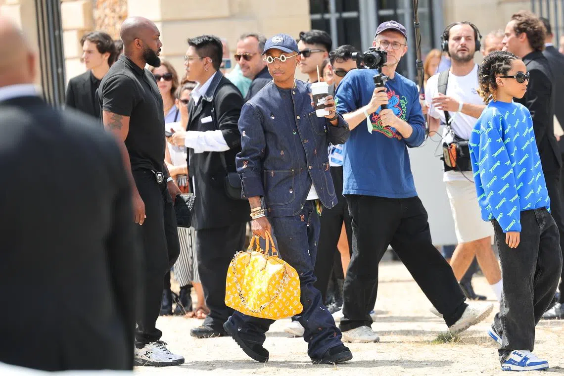 Pharrell Williams was spotted carrying the yellow version of the speedy at Paris fashion week this past summer.