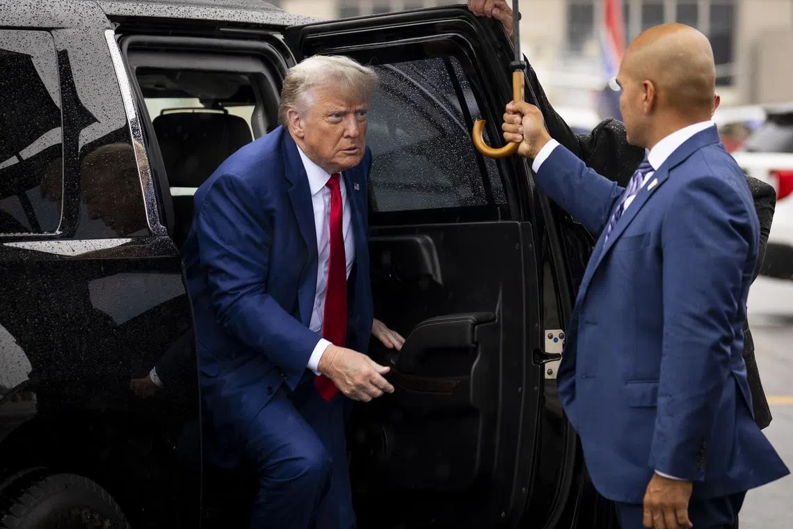 Donald Trump arrives to give a short statement to reporters at Reagan National Airport after his arraignment in federal court in Washington on Aug 3, 2023. 