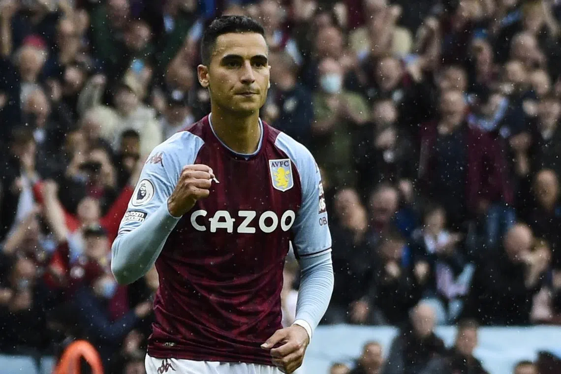 FILE PHOTO: Soccer Football - Premier League - Aston Villa v Newcastle United - Villa Park, Birmingham, Britain - August 21, 2021 Aston Villa's Anwar El Ghazi celebrates scoring their second goal from the penalty spot REUTERS/Rebecca Naden/File Photo