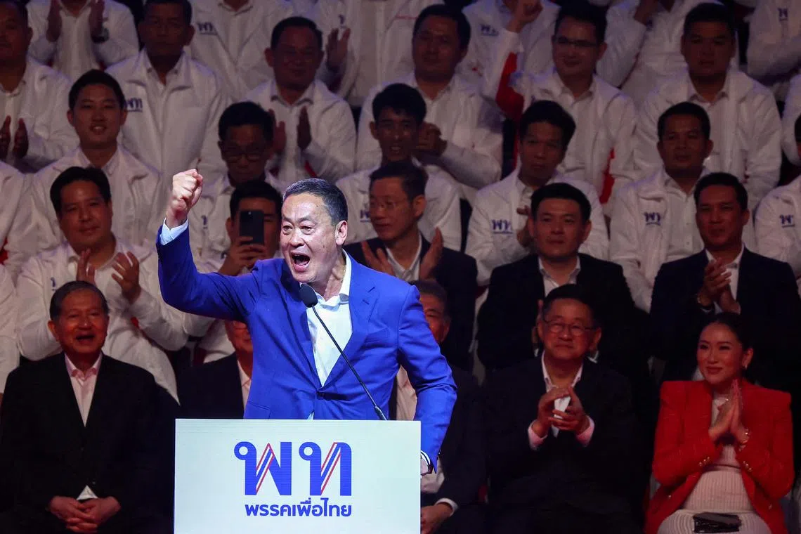 Srettha Thavisin, a local property tycoon and Pheu Thai Party's new adviser, lined up as one of the party's prime ministerial candidates, speaks during an event to unveil the party's candidates list and announce their policies for the upcoming general election, in Bangkok, Thailand, March 17, 2023. REUTERS/Athit Perawongmetha
