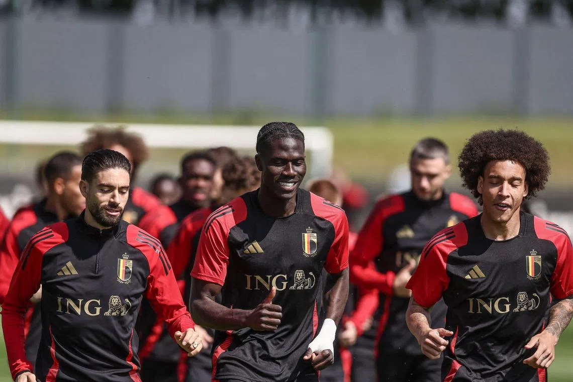 From far left: Belgium's Yannick Carrasco, Amadou Onana and Axel Witsel taking part in a training session as part of the team's preparation for the Euro 2024 European football Championships at the Royal Belgian Football Association's training centre in Tubize on June 7.