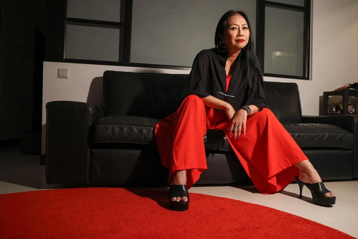 Susie Low in her signature mix-and-match look, built around bold colours.