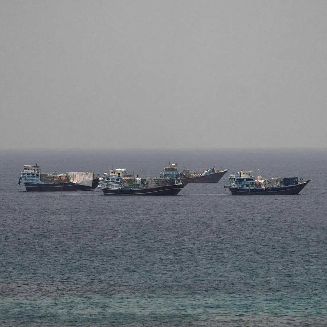 Vessels at the Strait of Hormuz, as seen from Musandam, Oman, July 1, 2026. REUTERS/Stringer     TPX IMAGES OF THE DAY