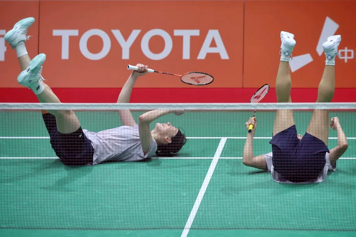 Lee So-hee (left) and Baek Hana of South Korea celebrating their win over Liu Sheng Shu and Tan Ning of China in the Aichi-Nagoya 2026 Asian Games badminton women's doubles final match at Ichinomiya City Municipal Gymnasium in Aichi, Japan on Sept 29, 2026. ST PHOTO: KEVIN LIM pixag29