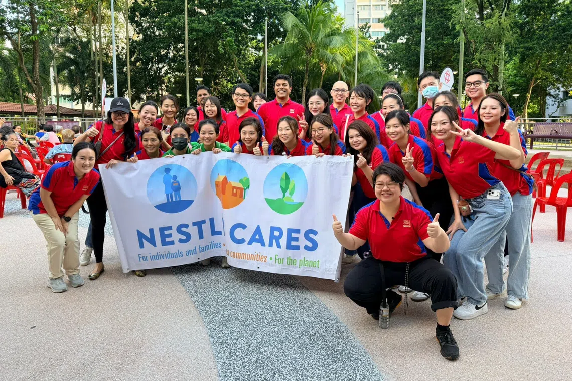 nestle singapore employees at market with love