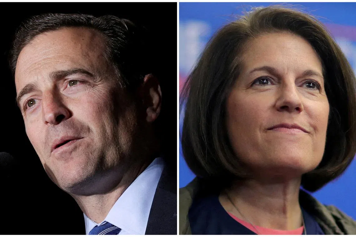 Republican U.S. Senate candidate Adam Laxalt and Senator Catherine Cortez Masto, a Democrat, attend rallies ahead of the midterm elections in Minden, Nevada, U.S., October 8, 2022 and Henderson, Nevada, U.S. November 7, 2022 in a combination of file photographs.  REUTERS/Carlos Barria/David Swanson