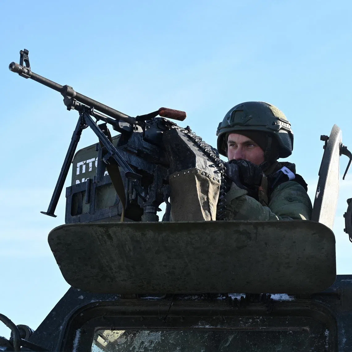 A Russian service member of a separate engineering unit of the Southern Military District aims a weapon while undergoing an intensive combat training in the Rostov region, Russia, January 19, 2026. REUTERS/Sergey Pivovarov