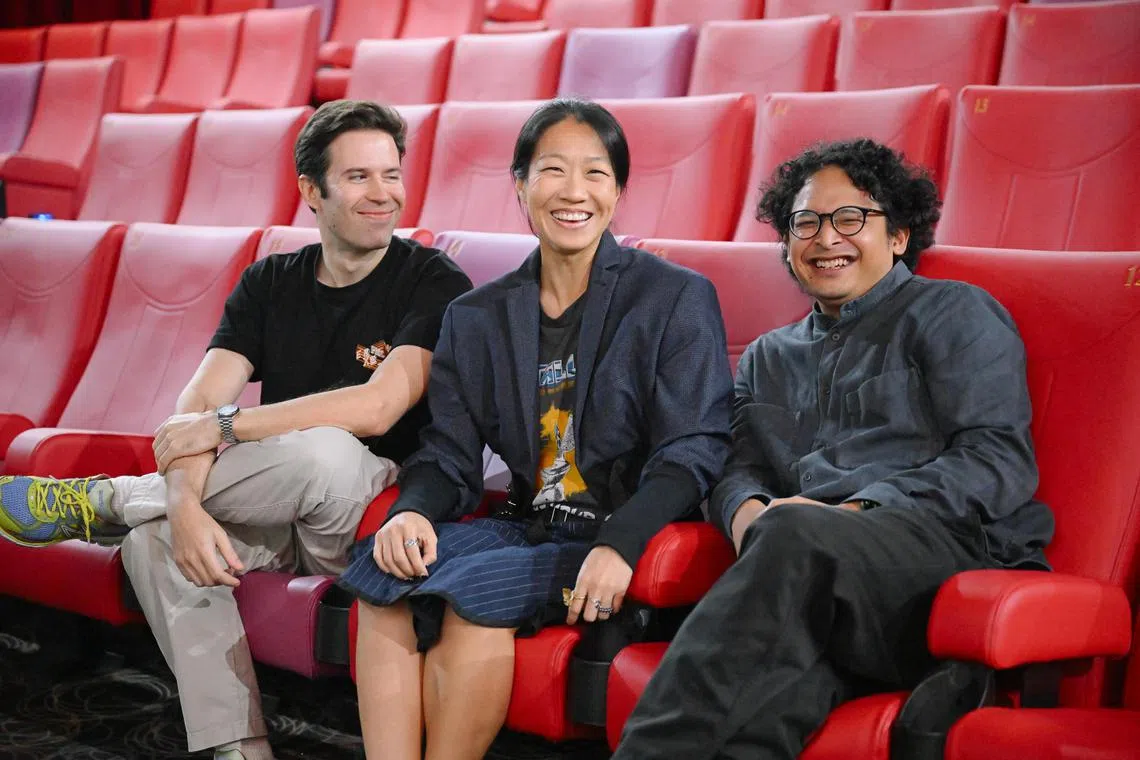 The Projector's founder Karen Tan (centre) together with designer Mirza Jaafar (right) and programmer Walter Navarro (left) at the Majestic cinema at Golden Village X The Projector at Cineleisure on Jan 23, 2025. The Projector is celebrating its tenth anniversary with various activities.