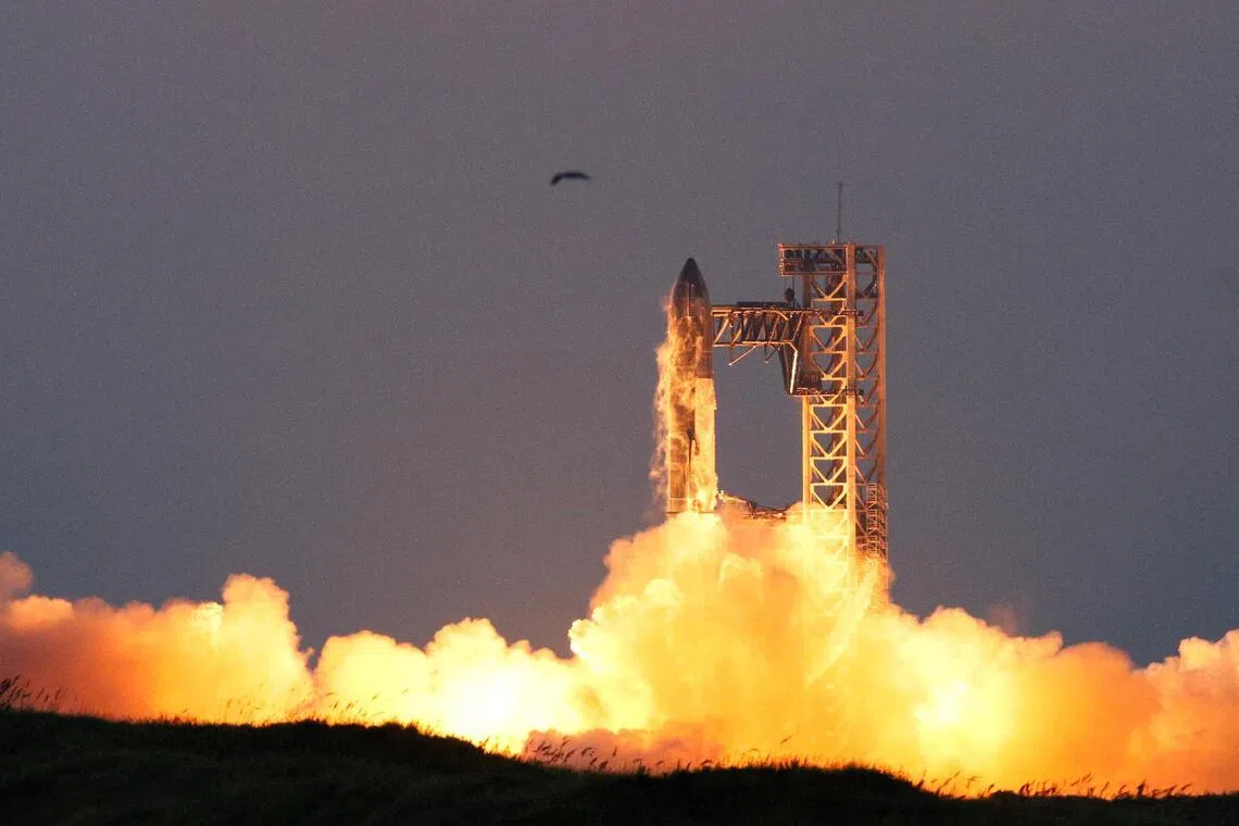 FILE PHOTO: SpaceX's Starship lifts off during its fifth flight test, in Boca Chica, Texas, U.S., October 13, 2024.  REUTERS/Kaylee Greenlee Beal/File Photo