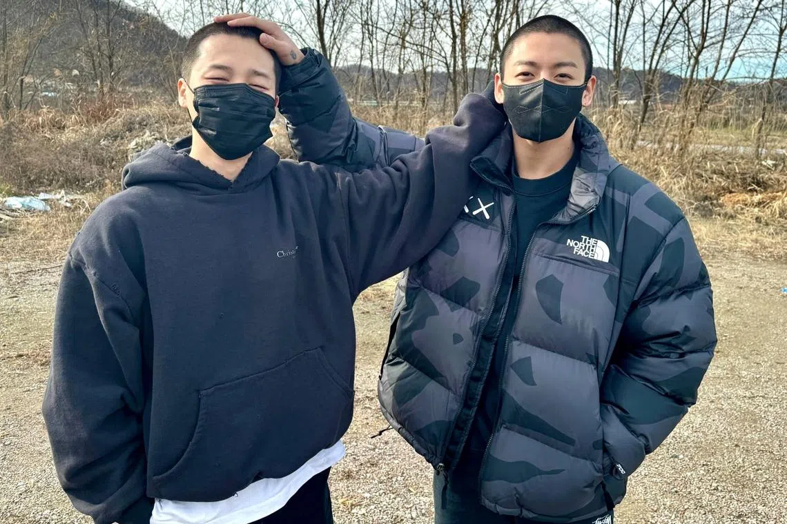 BTS members Jimin (left) and Jungkook are the last of the group to enlist.