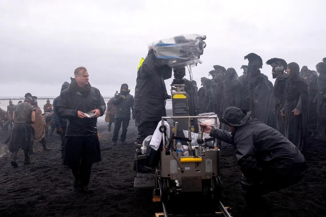 Director Christopher Nolan (left) on the set of The Odyssey.
