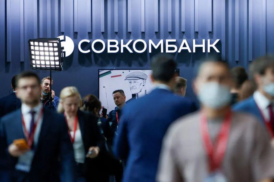 FILE PHOTO: A view shows a board with the logo of Sovcombank at the St. Petersburg International Economic Forum (SPIEF) in Saint Petersburg, Russia June 17, 2022. REUTERS/Maxim Shemetov/File Photo