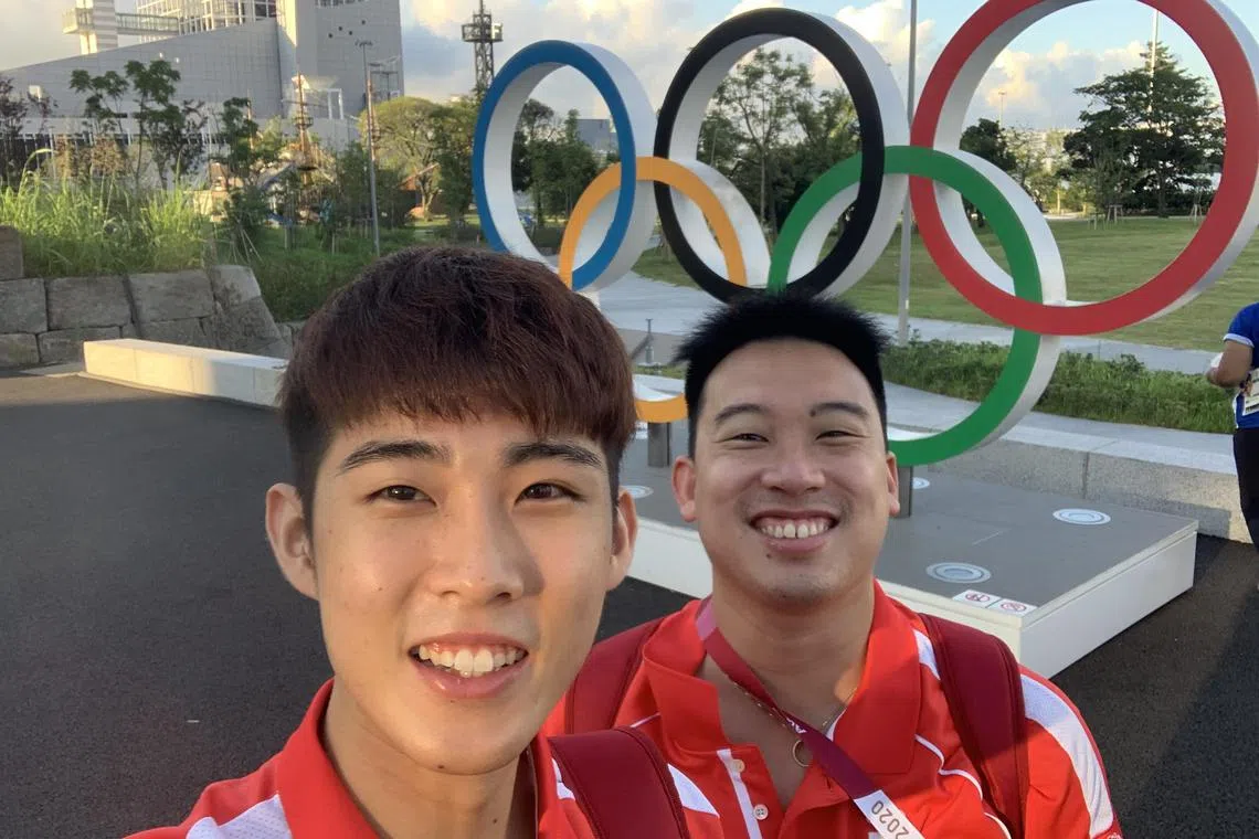 Singapore badminton national singles coach Kelvin Ho (right) and top men's singles Loh Kean Yew.