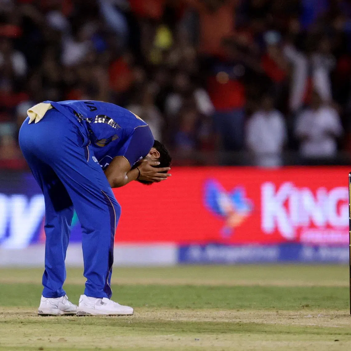 Cricket - Indian Premier League - IPL - Royal Challengers Bengaluru v Mumbai Indians - Shaheed Veer Narayan Singh International Cricket Stadium, New Raipur, India - May 10, 2026  Mumbai Indians' Raj Angad Bawa looks dejected after throwing the last ball of the match REUTERS/Sahiba Chawdhary