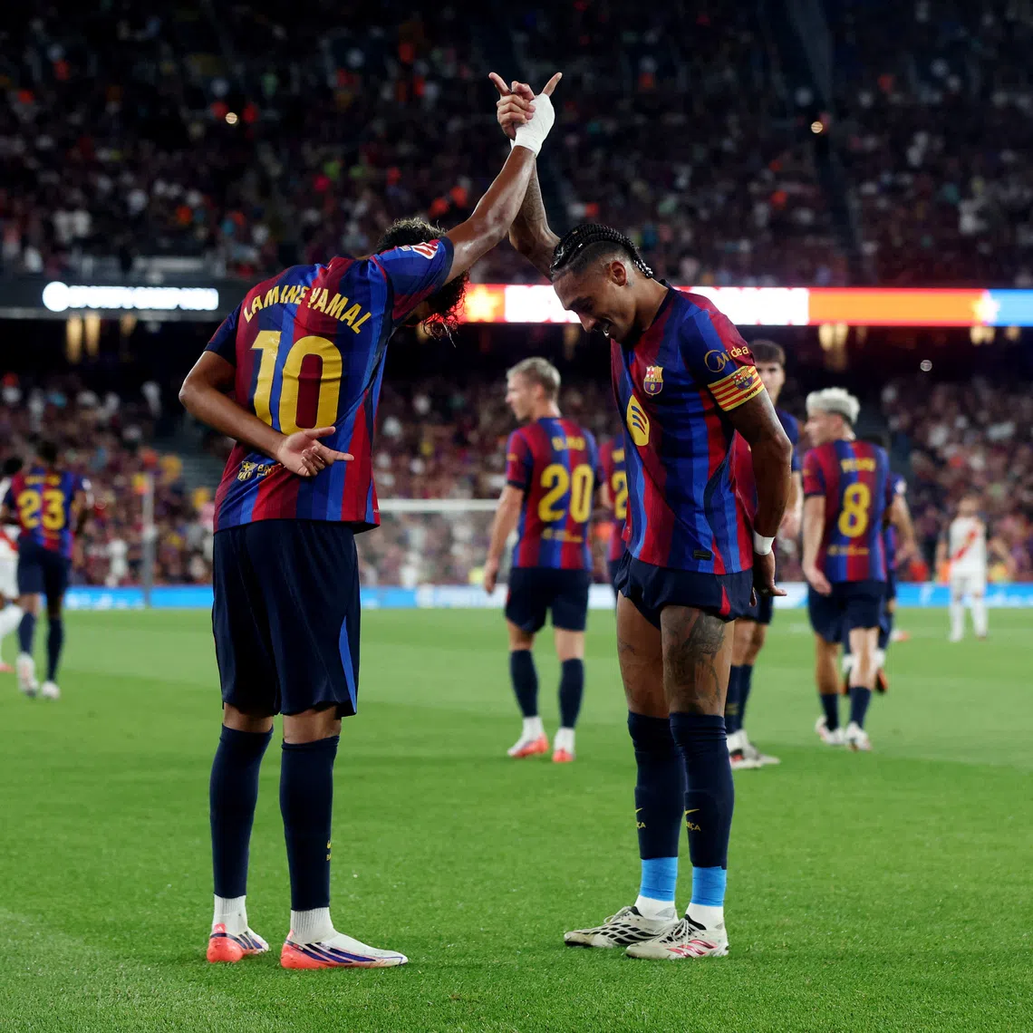 Soccer Football - LaLiga - FC Barcelona v Rayo Vallecano - Spotify Camp Nou, Barcelona, Spain - August 31, 2026 FC Barcelona's Lamine Yamal celebrates scoring their second goal with Raphinha REUTERS/Bruna Casas