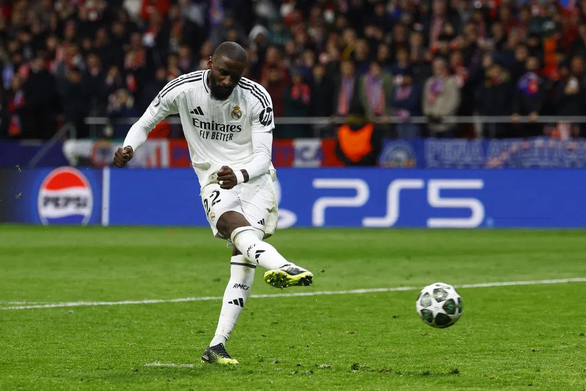 FILE PHOTO: Soccer Football - Champions League - Round of 16 - Second Leg - Atletico Madrid v Real Madrid - Metropolitano, Madrid, Spain - March 12, 2025 Real Madrid's Antonio Rudiger scores a penalty to win the penalty shootout REUTERS/Susana Vera/ File Photo