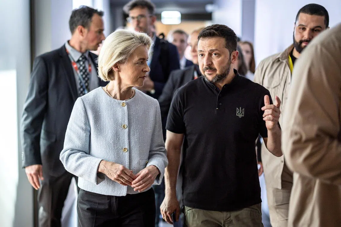 European Commission president Ursula Von der Leyen (left) and Ukrainian President Volodymyr Zelensky speaking at the Ukraine peace summit in Switzerland, on June 16. 