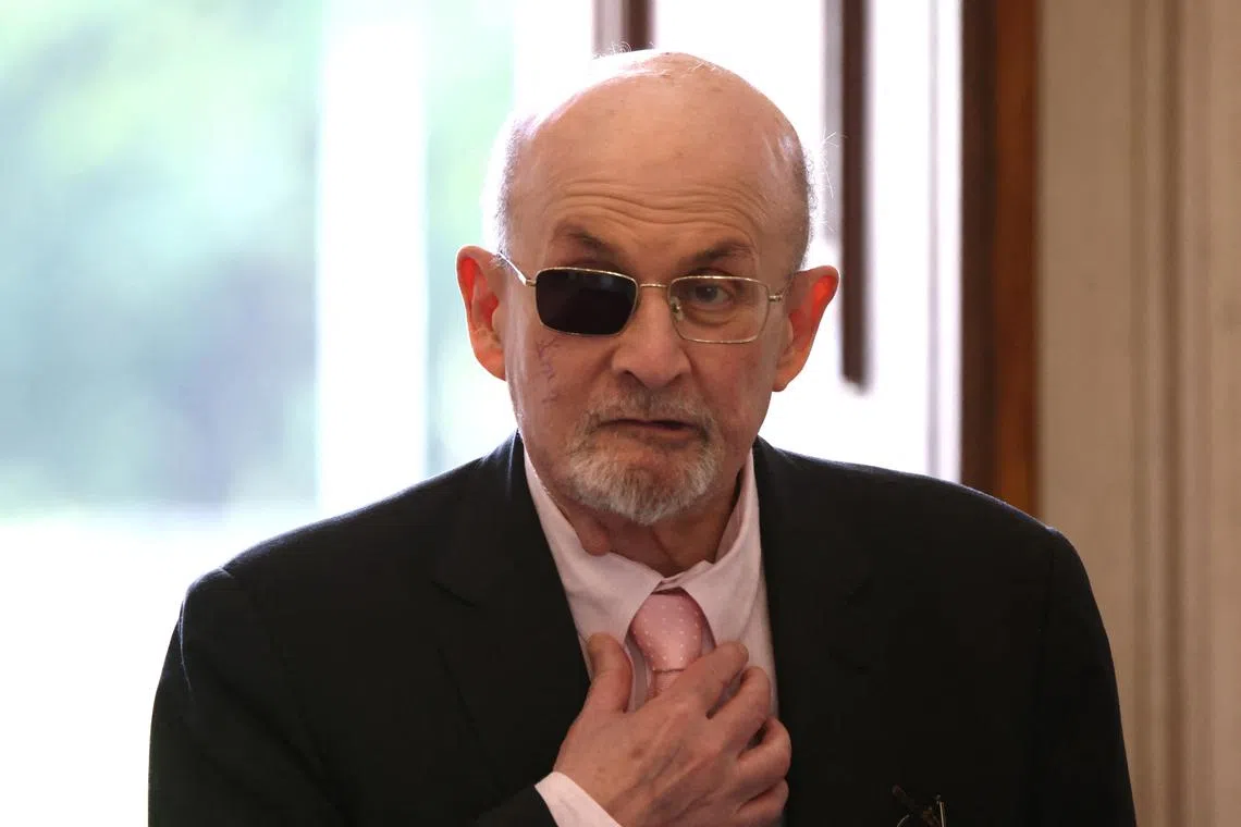 FILE PHOTO: Author Salman Rushdie arrives for a meeting with German President Frank Walter Steinmeier at Bellevue Castle in Berlin, Germany, May 16, 2024.    REUTERS/Liesa Johannssen/File Photo