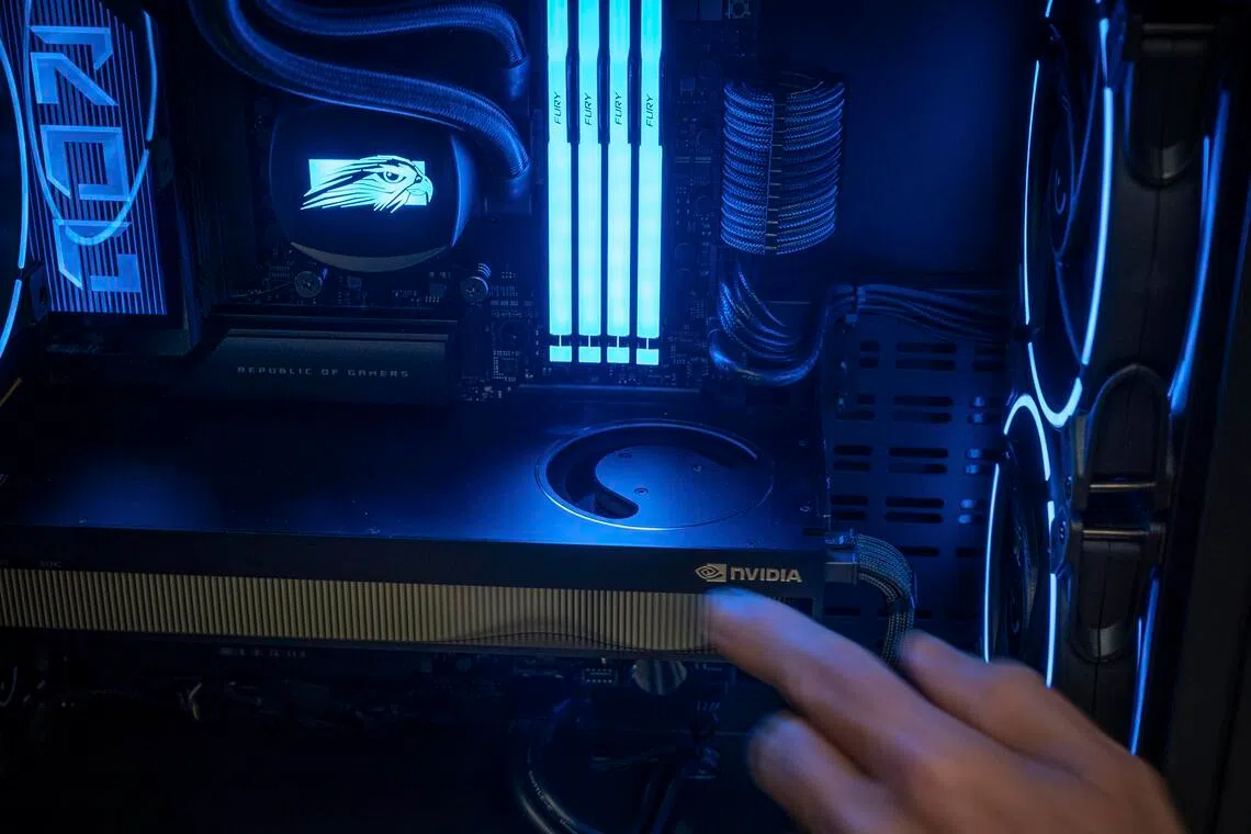 Illuminated memory modules inside a customized PC in the production room at Falcon Northwest which specializes in assembling customized PC.