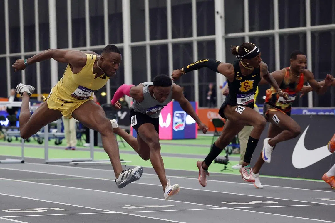 Grant Holloway crosses the finish line to win the 60m hurdles at the US trials on Feb 22.