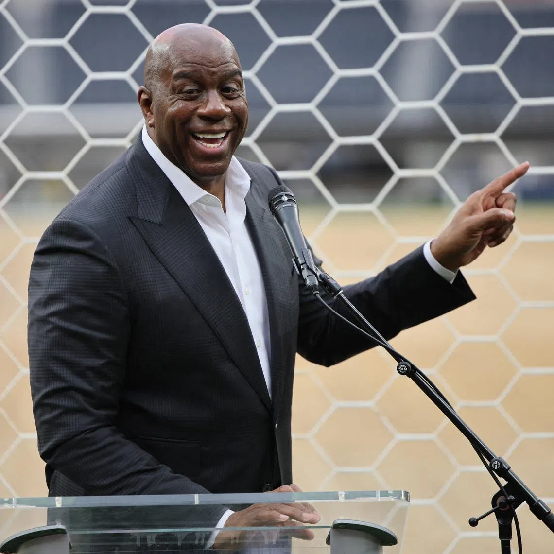 Soccer Football - Los Angeles marks 30 days to World Cup - SoFi Stadium, Inglewood, Los Angeles, California, U.S. - May 12, 2026 Former basketball player Earvin 'Magic' Johnson speaks during an event marking 30 days until the start of the World Cup. REUTERS/Daniel Cole