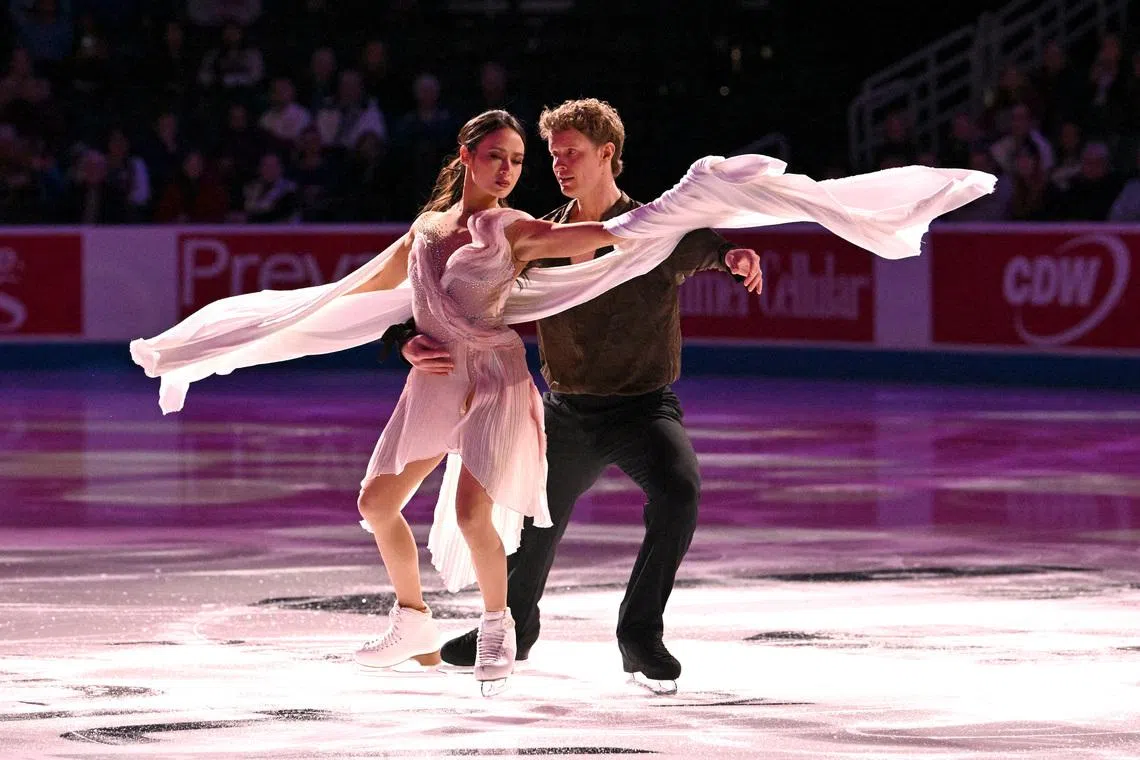 FILE PHOTO: Jan 11, 2026; St. Louis, Missouri, UNITED STATES; Madison Chock and Evan Bates perform during the 2026 U.S. Figure Skating Championships at Enterprise Center. Mandatory Credit: Jeff Le-Imagn Images/File Photo
