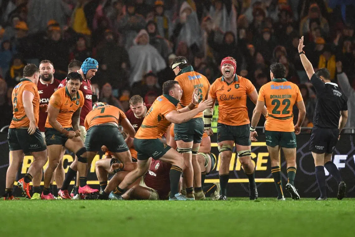 Australia celebrate their win over the Lions during the third Test match at Accor Stadium in Sydney on Aug 2.