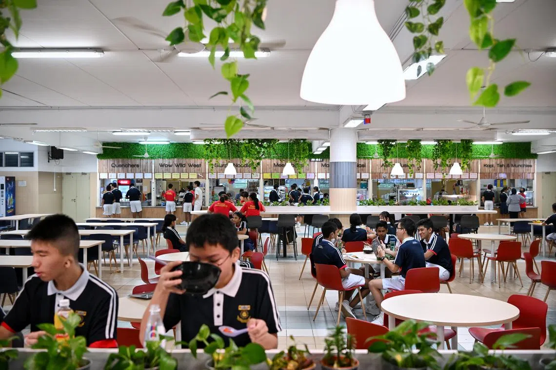 ST20230321_202311939693 Kua Chee Siong/ nzcanteen/ School canteens are no longer just functional spaces. From the furniture to the stalls, canteens are now more cafe-like instead of industrial looking. At Beatty Secondary School, the school has put in a couple of cool features including high tables, seating around pillars and a swing area, meant for students to capture Instagrammable moments. They also made the radio station studio visible to the students by putting in glass panes. There's also a stage and a piano for students to perform
