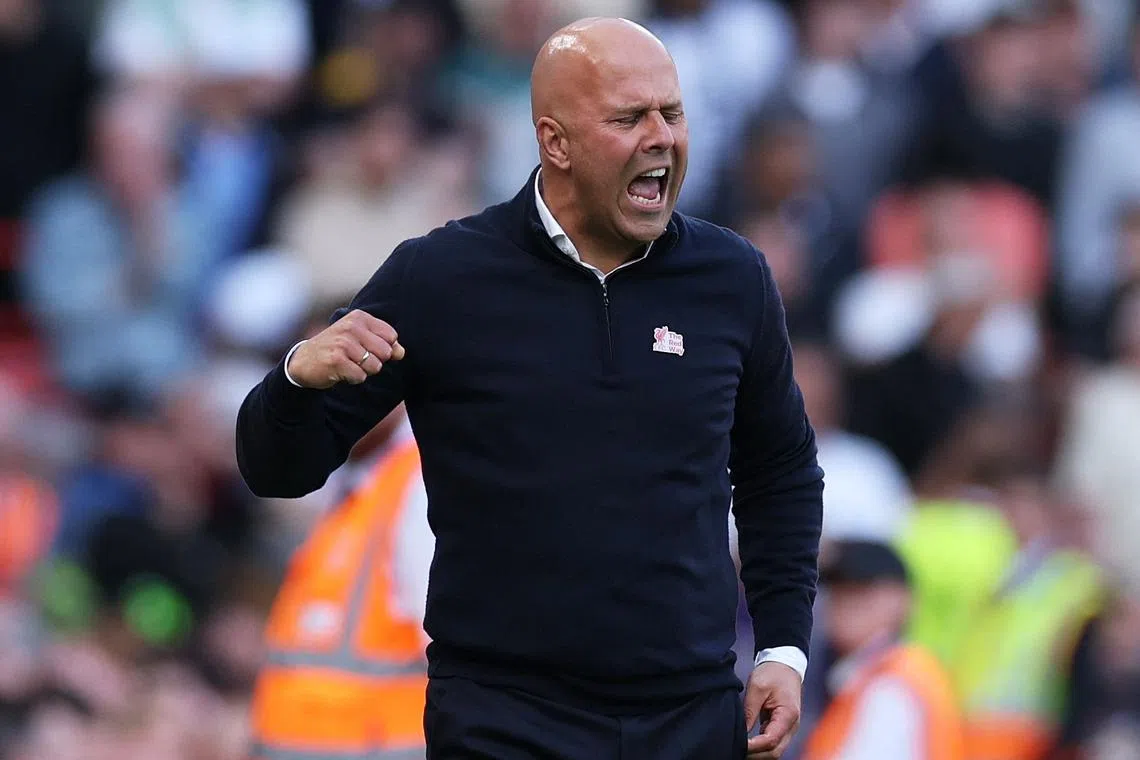 Soccer Football - Premier League - Liverpool v Tottenham Hotspur - Anfield, Liverpool, Britain - April 27, 2025 Liverpool manager Arne Slot celebrates after Luis Diaz scores their first goal REUTERS/Phil Noble