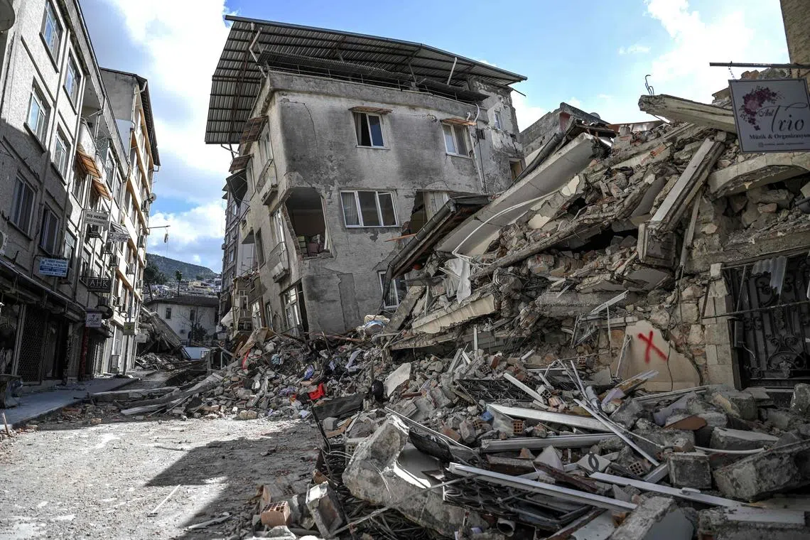Collapsed buildings in Hatay on March 6, one month after a massive earthquake struck southeastern Turkey.