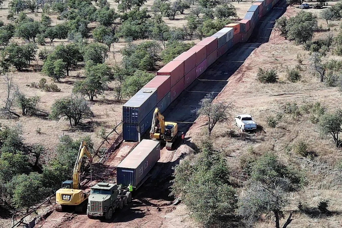 Former governor Doug Ducey ordered the installation of the line of shipping containers to stem illegal immigration.