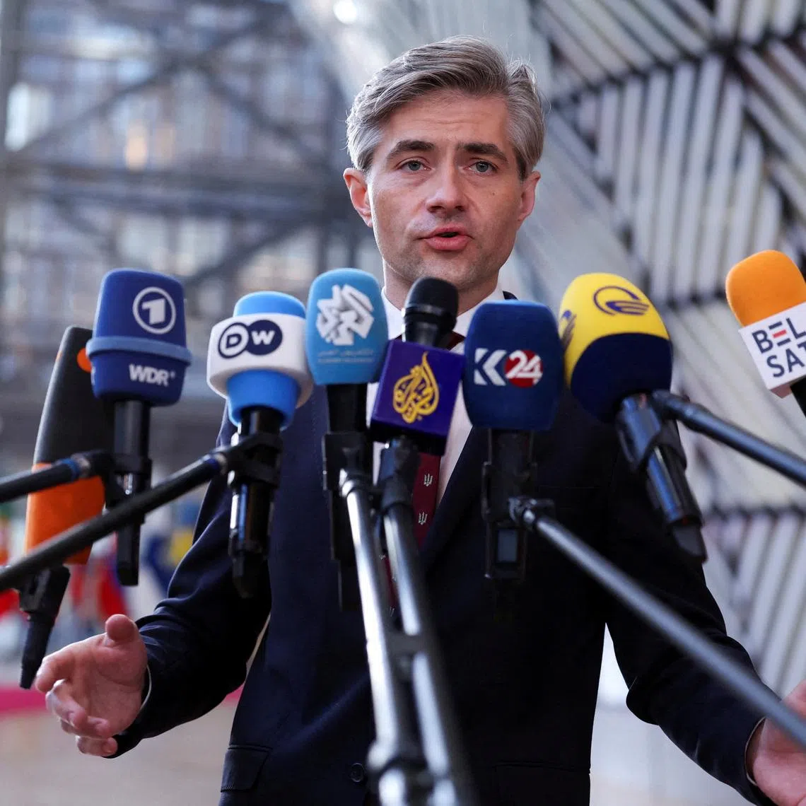 FILE PHOTO: Lithuania's Foreign Minister Kestutis Budrys speaks to members of the media as he arrives to attend a European Union Energy and Foreign Affairs ministers meeting in Brussels, Belgium March 16, 2026. REUTERS/Omar Havana/File Photo