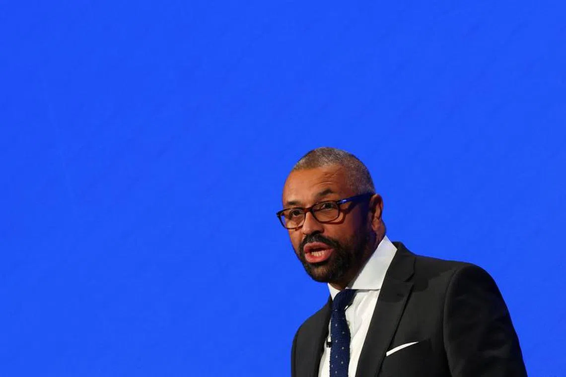 British Foreign Secretary James Cleverly speaks on stage at the Conservative Party's annual conference in Manchester, Britain, October 1, 2023. REUTERS/Hannah McKay/File Photo