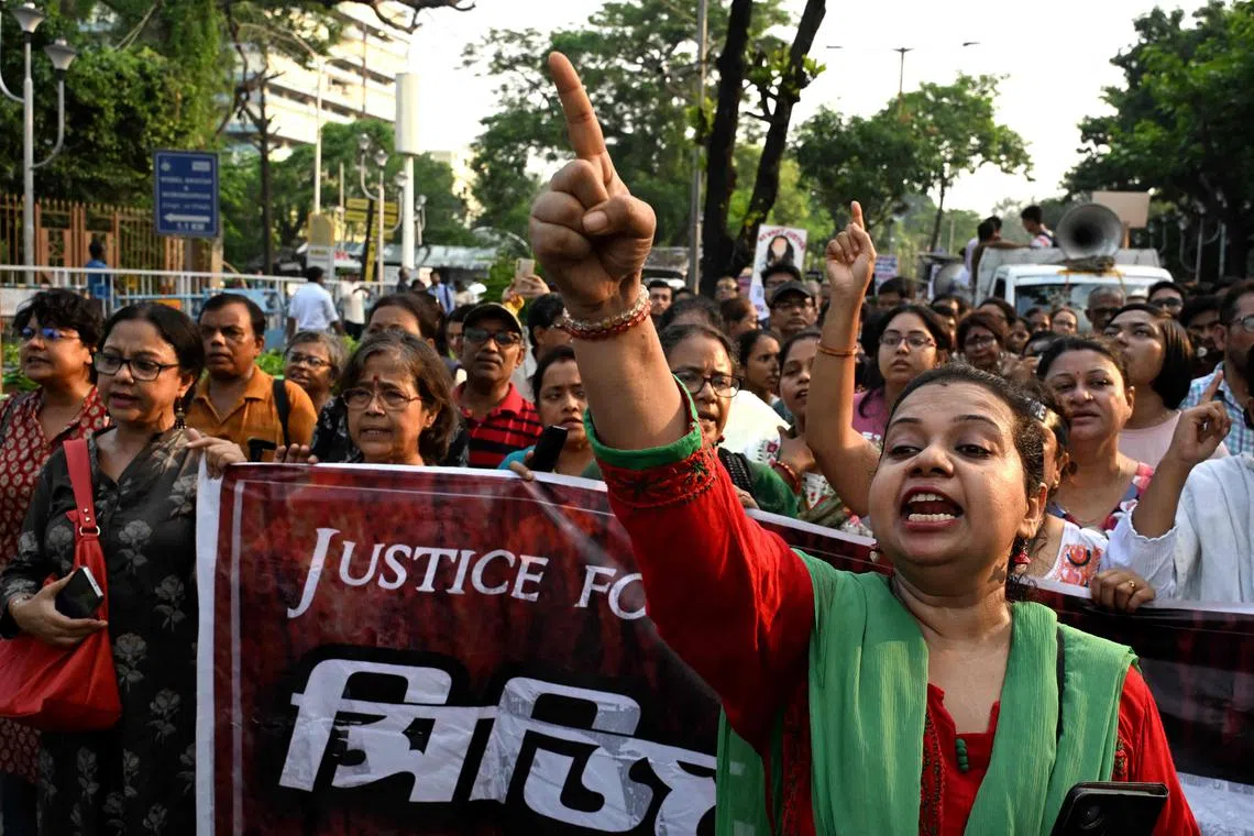 Activists and junior doctors take part in a protest to condemn the rape and murder of a doctor in Kolkata on Sept 20.