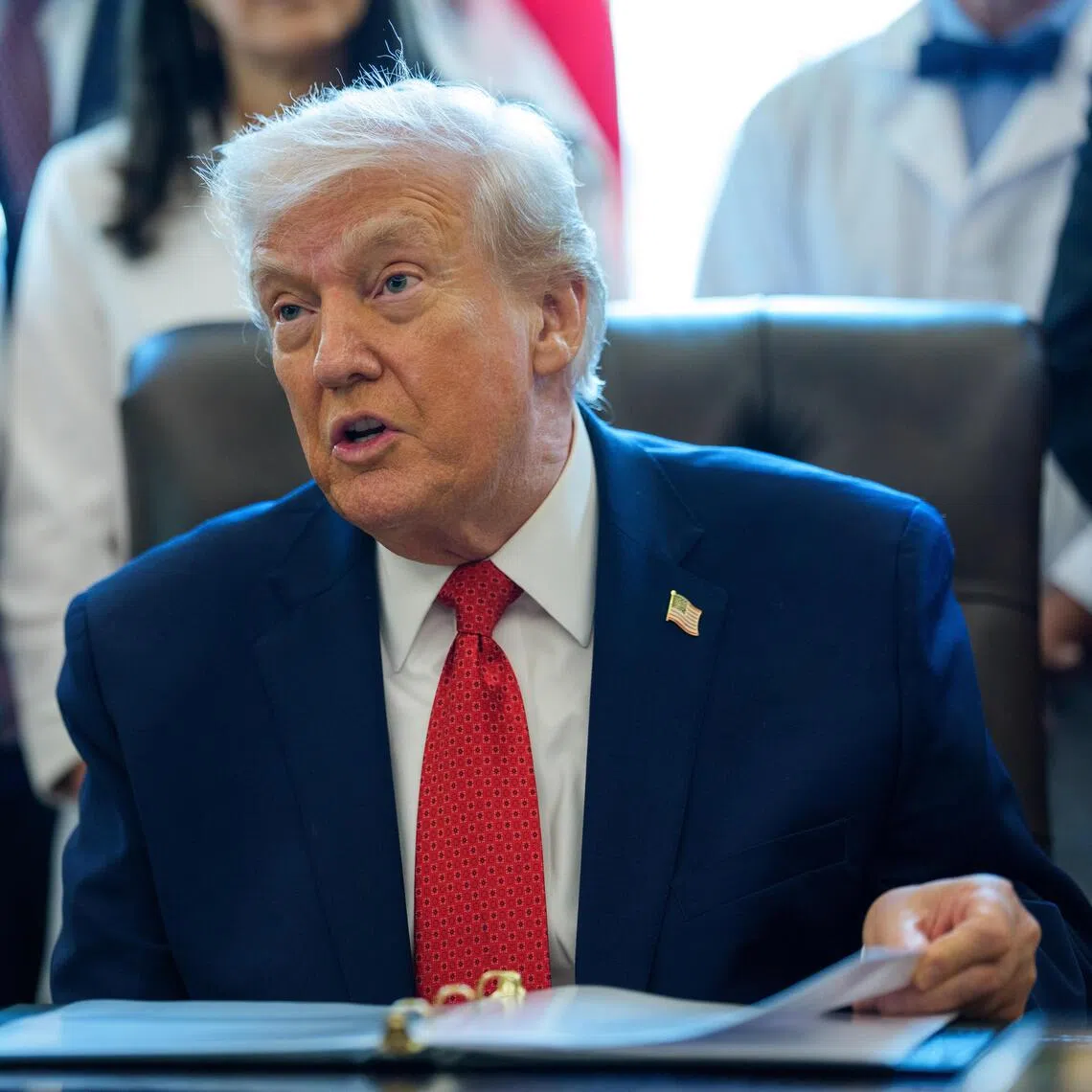 US President Donald Trump delivering remarks in the Oval Office of the White House on Dec 18.