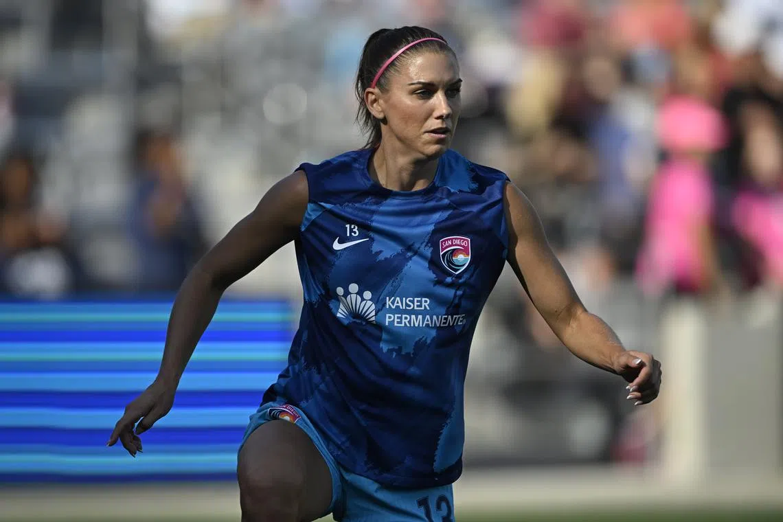 FILE PHOTO: Sep 1, 2024; San Diego, California, USA;  San Diego Wave FC forward Alex Morgan (13) warms up prior to the match lagainst the Washington Spirit at Snapdragon Stadium. Mandatory Credit: Denis Poroy-USA TODAY Sports/File photo