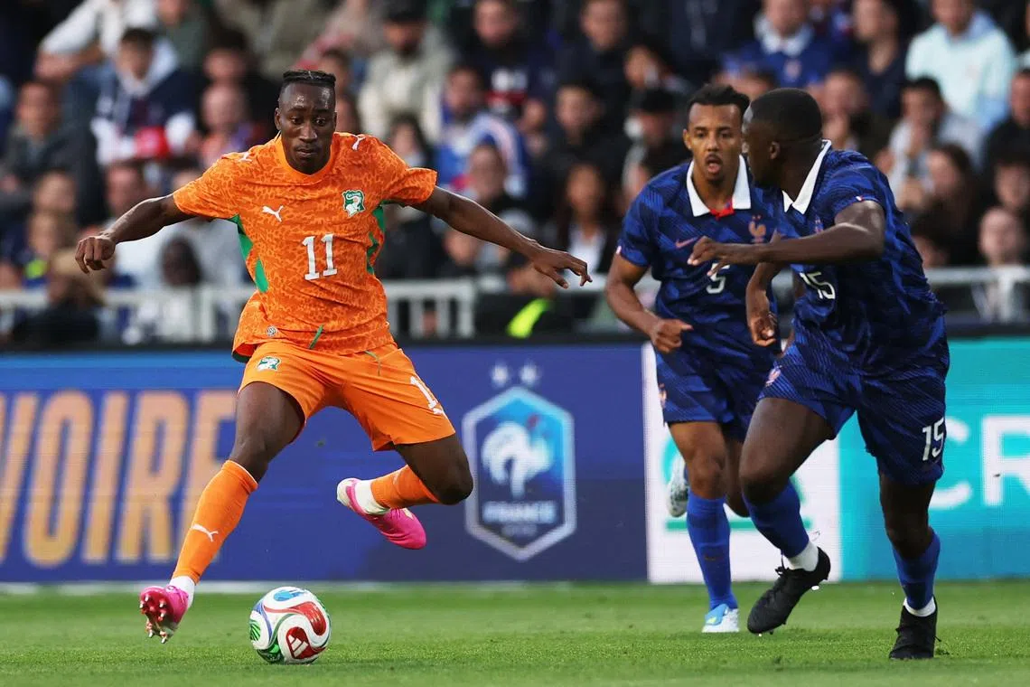 Soccer Football - International Friendly - France v Ivory Coast - The Stade de la Beaujoire - Louis Fonteneau, Nantes, France - June 4, 2026 Ivory Coast's Yan Diomande in action with France's Ibrahima Konate REUTERS/Gonzalo Fuentes