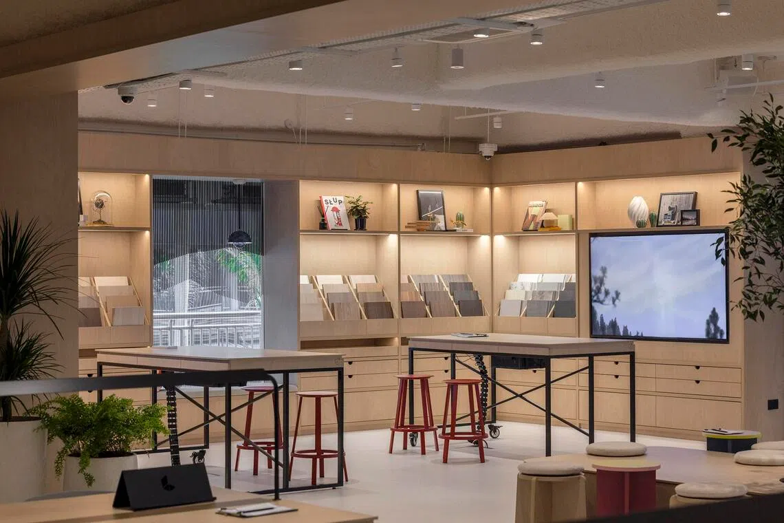 The Lamitak City showroom lets homeowners sample laminates in a style that fuses old-school touch with interactive tech.