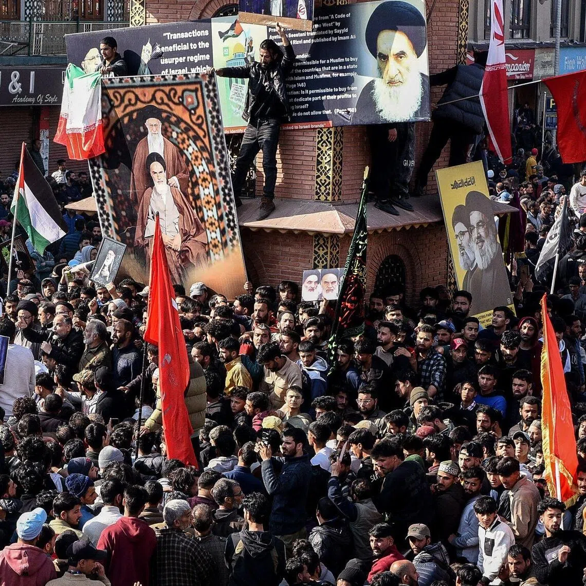 Shi’ite Muslims gather during an anti-US and Israel protest in Srinagar, in India-administered Kashmir, on March 1.