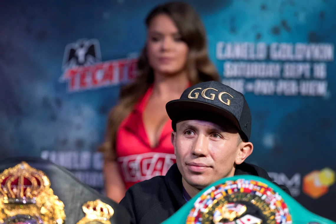 WBC/WBA/IBF middleweight champion Gennady Golovkin of Kazakhstan sits behind his belts during a news conference at MGM Grand hotel and casino in Las Vegas, Nevada, U.S. September 13, 2017. REUTERS/Las Vegas Sun/Steve Marcus