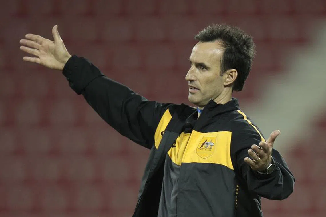 Australia's head coach Aurelio Vidmar reacts during their 2012 London Olympic Games third qualifying round soccer match against Iraq at the Al-Arabi Stadium in Doha November 22, 2011.  REUTERS/Fadi Al-Assaad (QATAR - Tags: SPORT SOCCER)