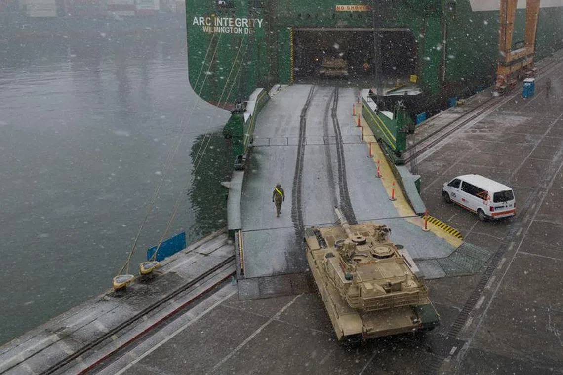 Abrams tank from U.S. 2nd Armored Brigade Combat Team (ABCT) is unloaded as it arrived in the Polish port of Gdynia as part of NATO's Operation Atlantic Resolve in Gdynia, Poland December 3, 2022. REUTERS/Kacper Pempel/File Photo