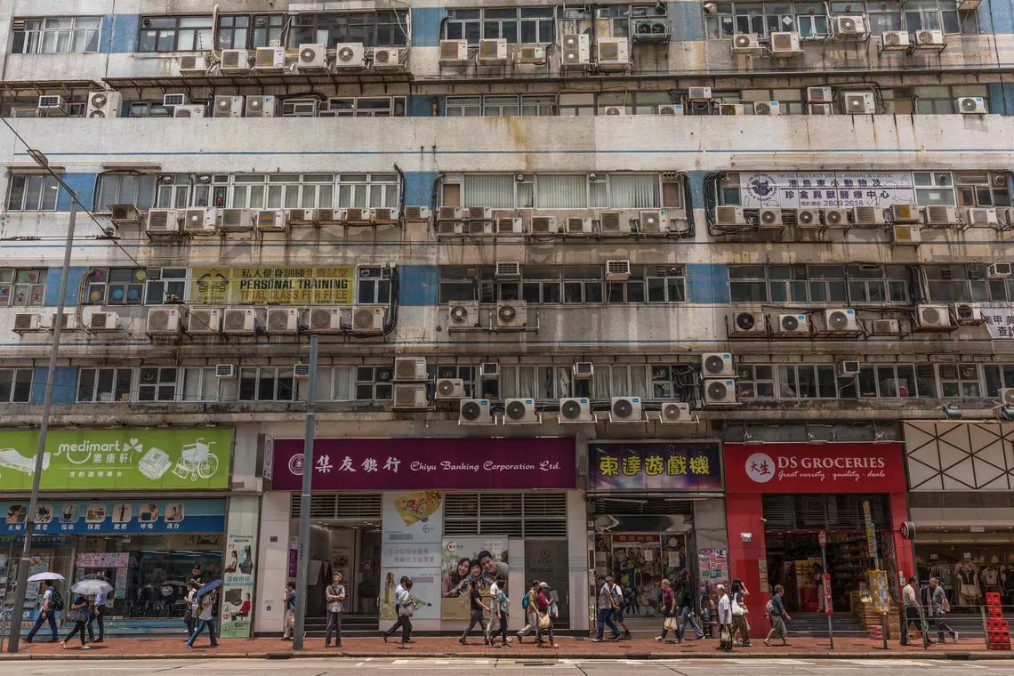 Air-conditioning units on a commercial building in Hong Kong on April 30, 2024.