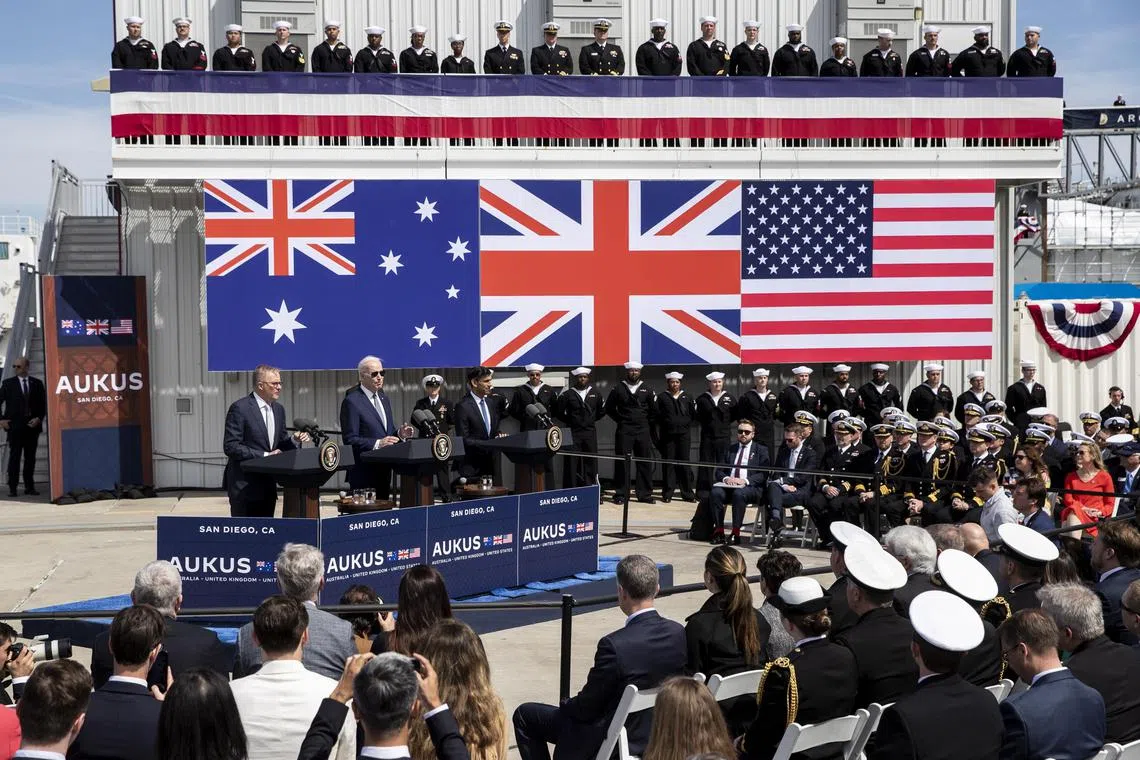 The nuclear-powered submarines plan was announced on March 13 at a press conference by (from left) Australian PM Anthony Albanese, US President Joe Biden and British PM Rishi Sunak.