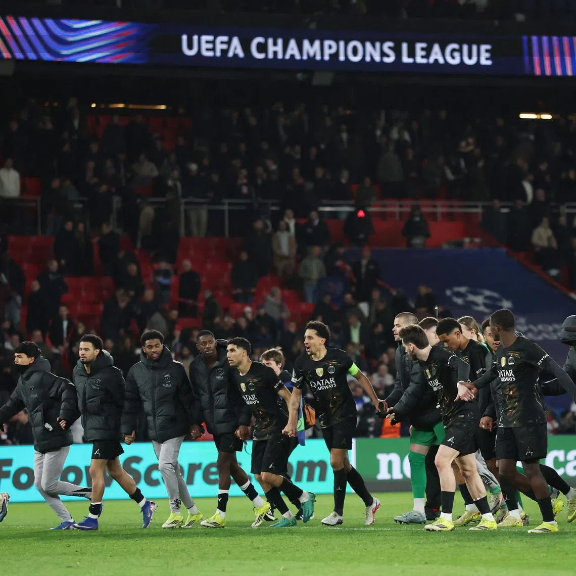 Soccer Football - UEFA Champions League - Round of 16 - First Leg - Paris St Germain v Chelsea - Parc des Princes, Paris, France - March 11, 2026 Paris St Germain players celebrate after the match REUTERS/Stephane Mahe