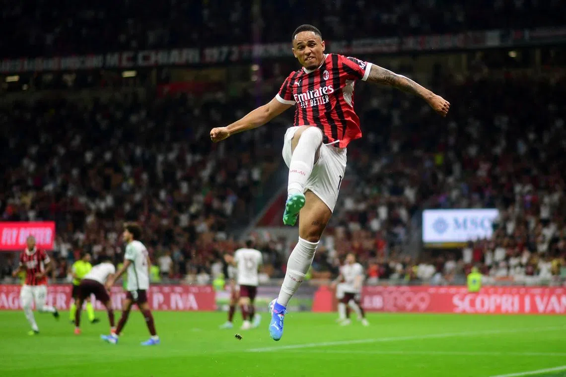 Soccer Football - Serie A - AC Milan v Torino - San Siro, Milan, Italy - August 17, 2024 AC Milan's Noah Okafor celebrates scoring their second goal REUTERS/Daniele Mascolo
