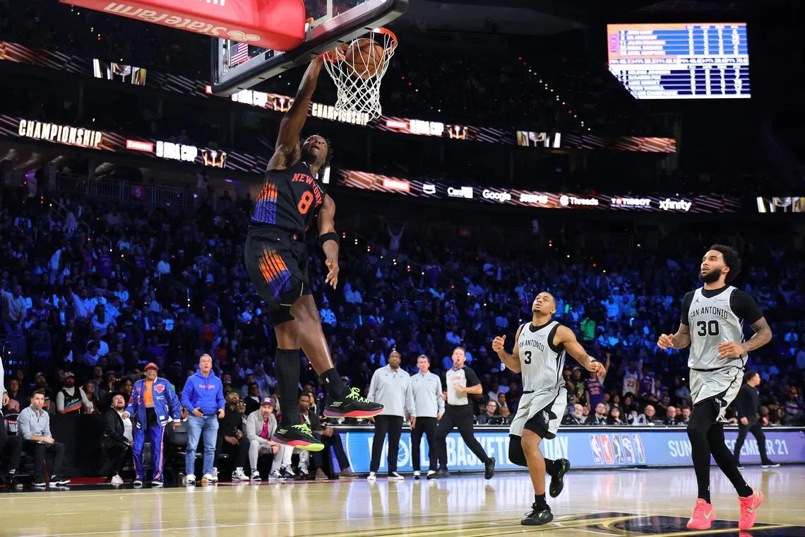 OG Anunoby of the New York Knicks dunks the ball during the second quarter against the San Antonio Spurs.